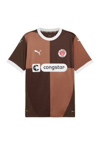 Pruun jalgpallipaita, millel on heledamad pruunid sektsioonid, valge krae ja lühikesed varrukad. Esiküljel on Puma logo ja sponsori logo.