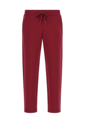 Burgunderfarbene Sweatpants aus weichem Stoff, mit elastischem Bund und Kordelzug, Seitentaschen und schmaler geschnittenen Beinen.