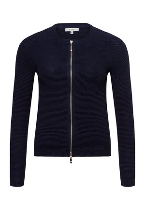 Marineblauwe gebreide cardigan met een ronde hals, lange mouwen en een ritssluiting. Heeft een textuurstof en een ribbelzoom.