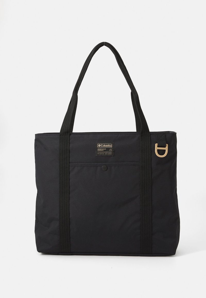 Sac fourre-tout en nylon noir avec deux poignées supérieures, forme rectangulaire, grand compartiment principal, poche avant avec bouton et accents dorés.