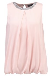 Blusa sin mangas de color rosa empolvado con un plisado en el frente, decorada con un escote plateado brillante. Tejido suave y fluido con un corte relajado.