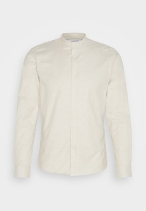 Lichtbeige button-up shirt met een soort kraag, lange mouwen en een gestructureerde stof. Heeft een voorste knoopsluiting en enkele manchetten.