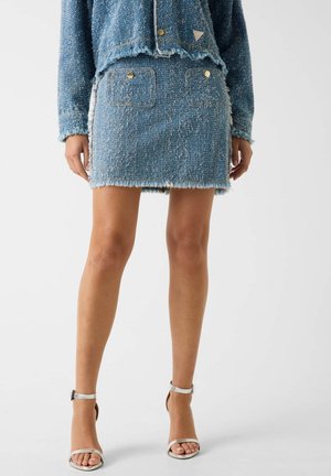 - Spódnica jeansowa