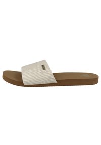 Sandale blanche à glissière avec une bride texturée et une semelle plate en caoutchouc brun. Étiquette de marque "REEF" sur la bride ; design simple et minimaliste.