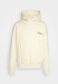 Cremefarvet hætte sweatshirt med en kængurutaske, ribbede manchetter og kant. Har trykt tekst "ORIGINALS CPH" på brystet.