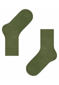 Oliwkowe skarpetki z prążkowanym mankietem i gładką fakturą, z zaokrąglonym noskiem i bezszwową konstrukcją. Lekka i dobrze dopasowująca się konstrukcja.