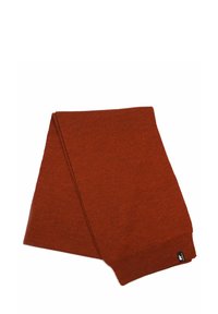 Sciarpa lavorata a maglia color ruggine con bordo a coste e una piccola etichetta nera in fondo. Texture morbida con una trama uniforme.