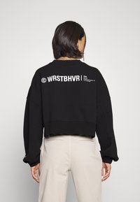 WRSTBHVR Sudadera - black