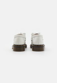 Dr. Martens Chaussons - white