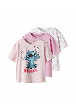 Kolm lühikese varrukaga T-särki: üks roosa sinise multikategelasega, üks ühtlane roosa ja üks valge korduva roosa mustriga. Puuvillane materjal.