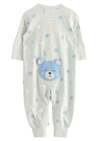 Ljust grön jumpsuit med en björnfjädrad ficka, himmelska mönster och elastiska ärmslut. Tillverkad av mjukt tyg med en slät yta.