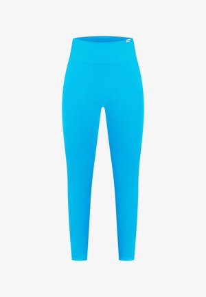 Leggings cylindriques taille haute en bleu vif. Fabriqués dans un tissu lisse et extensible de couleur unie, sans motifs ni accents visibles.