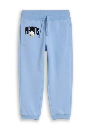 Hellblaue Jogginghosen mit dem Text "Peanuts" und einer Grafik von Snoopy mit Fußballhelm am linken Oberschenkel, Vordertaschen und Kordelzugbund.