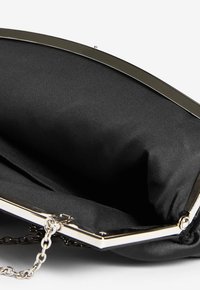 Next Clutch - black
