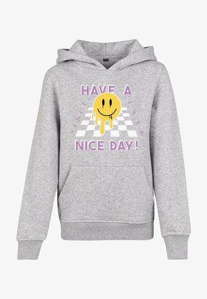 Sweatshirt à capuche gris avec poche avant, présentant un visage souriant jaune fondant et le texte "Passe une bonne journée !" sur un fond à carreaux.