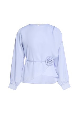 Long sleeve light blue blouse with round neck, gathered cuffs, waist belt, and fabric flower detail on the side.