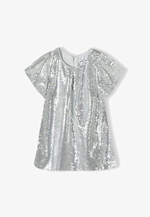 Haut à sequins argentés avec manches courtes, encolure arrondie et fermeture à boutons dans le dos. Surface brillante et texturée, coupe ample.