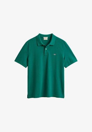 Groen poloshirt met korte mouwen, twee knopen aan de sluiting, klein geborduurd logo op de linkerborst en zijsplitten aan de zoom.
