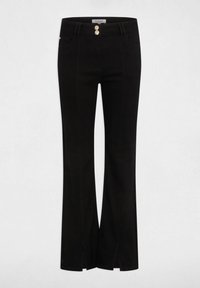 Pantaloni svasati neri con vita aderente, dotati di due bottoni dorati e spacchi all'orlo. Realizzati in un tessuto morbido e elastico.
