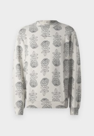 Sweatshirt beige à manches longues avec un motif répétitif de roses grises et de feuilles, avec un logo Marimekko près du col.