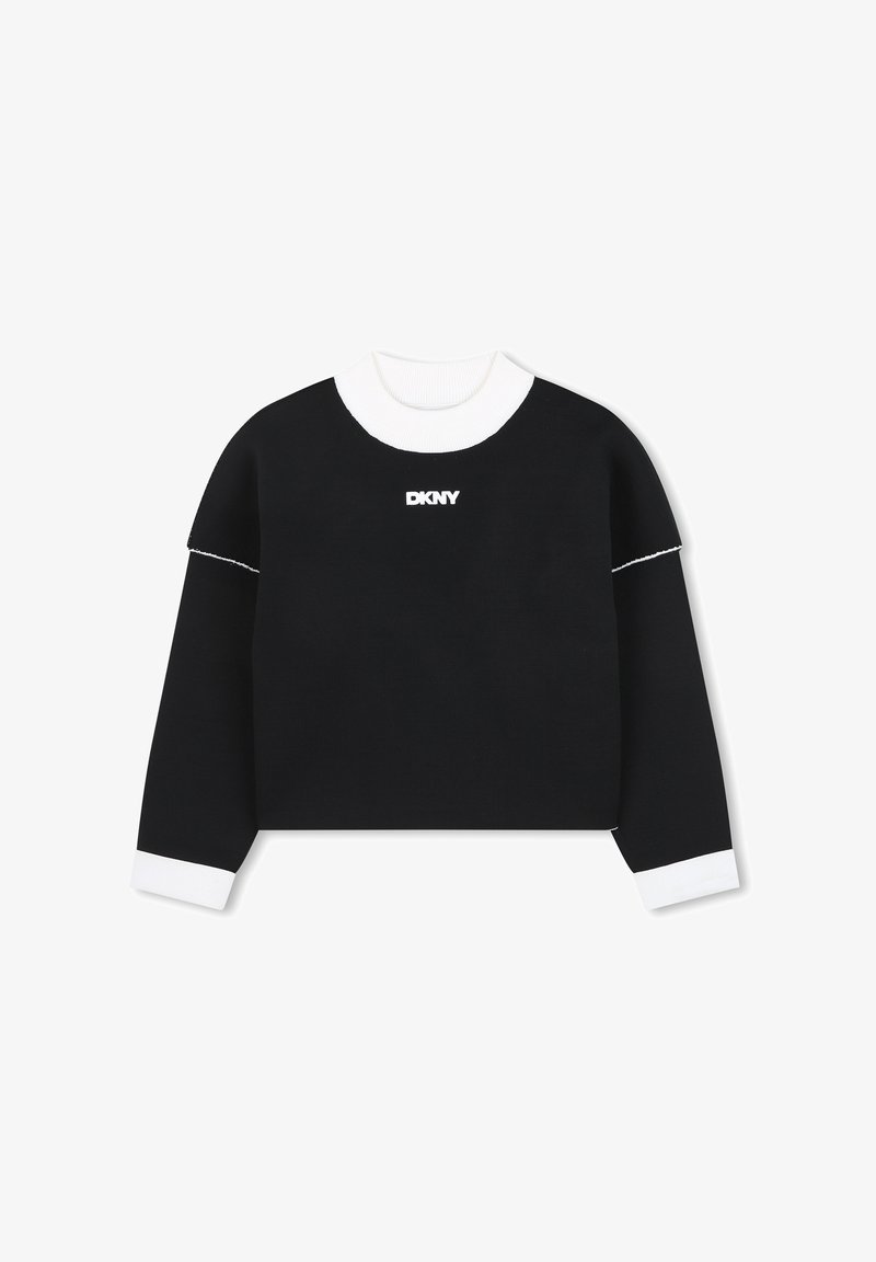 Czarny krótki sweter z długim rękawem z białym ściągaczem i mankietami, białe przeszycia na rękawach oraz białe logo DKNY umieszczone na środku piersi.