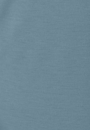 Tessuto di cotone blu chiaro con una trama liscia, caratterizzato da un motivo a maglia uniforme. Nessun accento o hardware degni di nota presenti.