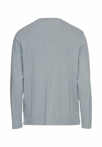 Langarm-T-Shirt in Hellgrau, mit weicher Textur, Rundhalsausschnitt, geradem Saum und seitlichen Schlitzen, mit einem dezenten Melange-Muster.