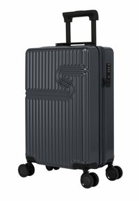 Harde koffer in donkergrijs, met een verticale ribbeltextuur, een uitschuifbare handgreep en spinnerwielen voor eenvoudige mobiliteit.