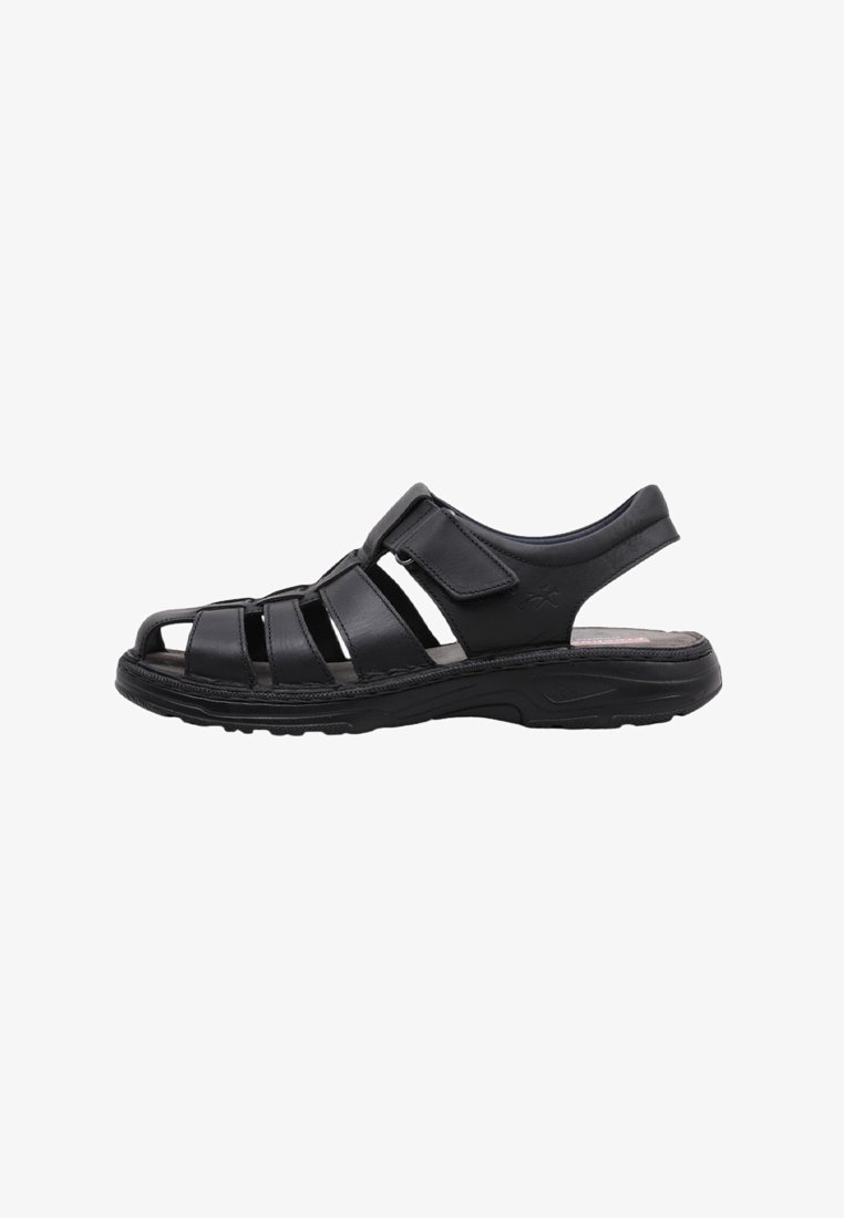 Sandale en cuir noir avec des sangles ouvertes, fermetures Velcro réglables, semelle intérieure rembourrée et semelle en caoutchouc pour l'adhérence et le confort.