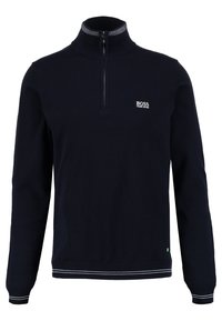 Marinblå långärmad pullover med kvartdragkedja, hög krage, vit "BOSS Hugo Boss" logotyp på bröstet, samt vita randiga mudd och nederkant.
