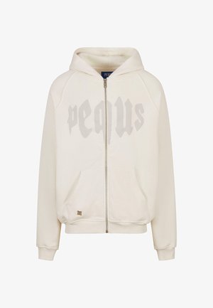 Kremfarget hettegenser med glidelås laget av mykt stoff, med stor tonet grafisk tekst foran, kengurulommer og ribbestrikkede mansjetter.