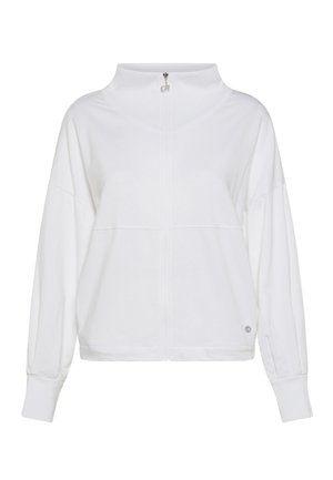 Valkoinen vetoketjullinen paita, jossa korkea kaulus, lörpötetyt olkapäät ja resorit hihansuuissa. Helmassa on hienovarainen logotyyppinen yksityiskohta. Pehmeä tekstuuri.