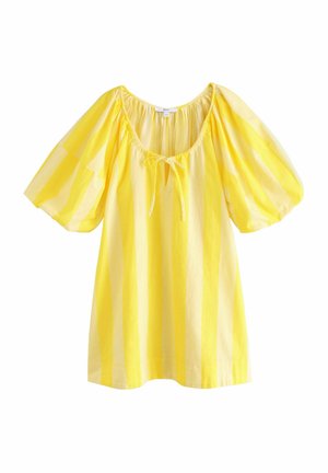 Top cu mâneci puff cu dungi galbene, guler rotund și detaliu cu fundiță în față. Realizat dintr-un material ușor, cu o textură moale.