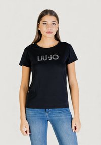 T-shirt noir à manches courtes avec logo "LIU•JO" en strass sur le devant, fabriqué en tissu lisse avec un col rond classique.