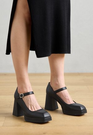 Højhælede pumps - black
