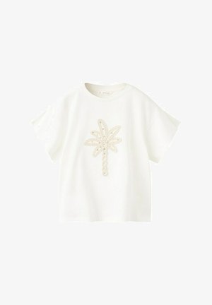 T-shirt blanc à manches courtes avec un col rond et un motif central de palmier en perles aux tons beige et or.