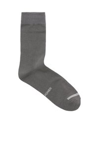 Grijze katoenen sok met een geribbelde boord, een gladde textuur, versterkte teen en een witte streep bij de teen. Merkennaam op de zijkant gedrukt.