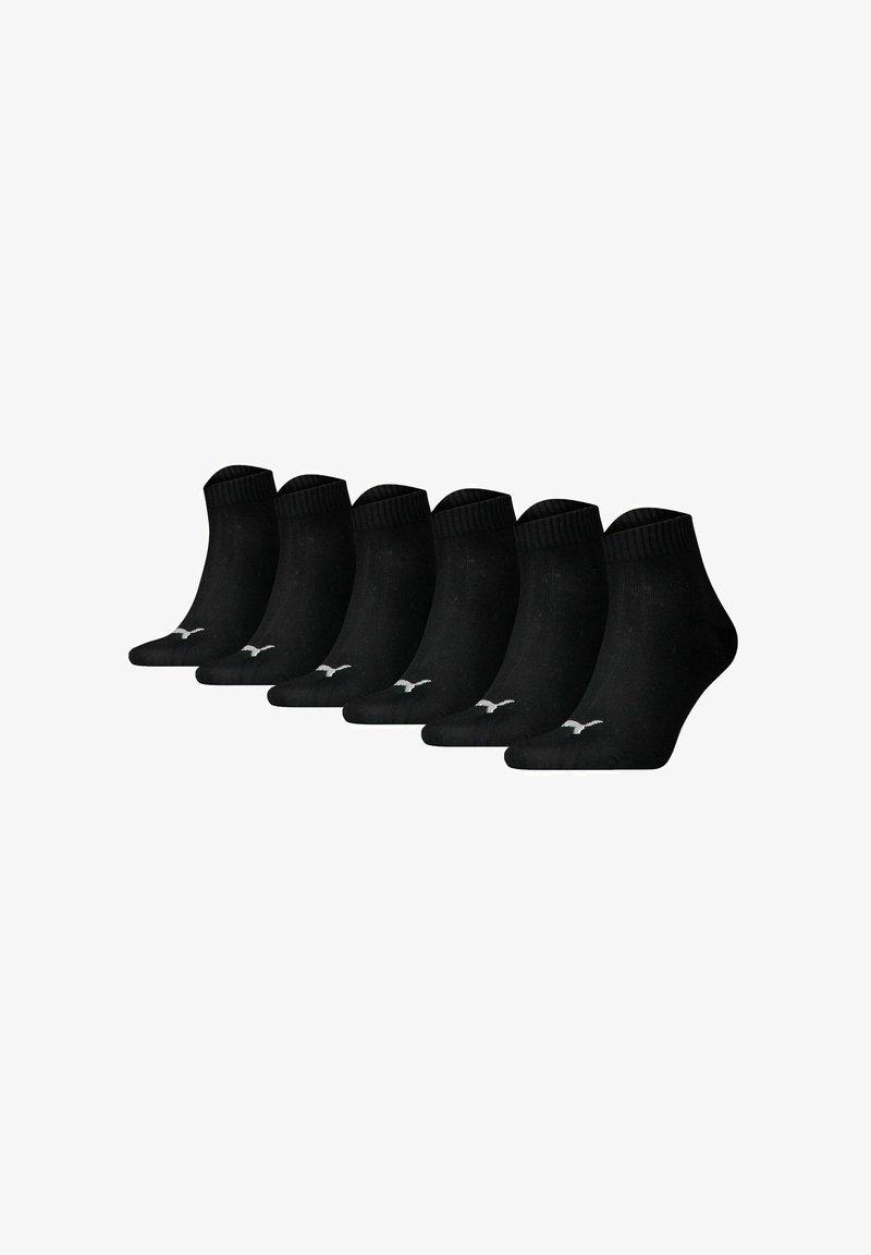 Schwarze Knöchelsocken, Sechserpack, aus einem weichen Stoff hergestellt. Mit einem gerippten Bund und einem kleinen weißen Logo an der Seite.