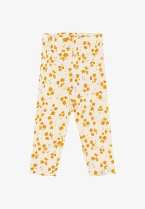 Florale Leggings aus cremefarbenem Stoff mit einem verstreuten Muster aus gelben Blumen und grünen Stielen; weiches, dehnbares Material.