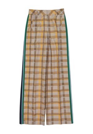 Pantalones anchos de cuadros en beige y amarillo con rayas verticales laterales en verde y negro y bolsillos delanteros.
