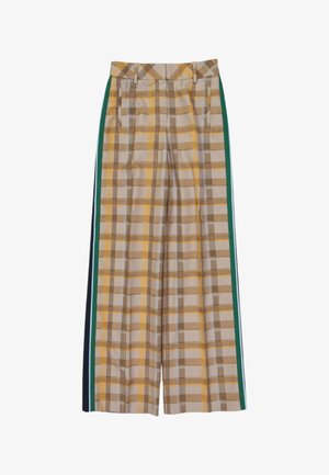 Pantalones anchos de cuadros en beige y amarillo con rayas verticales laterales en verde y negro y bolsillos delanteros.