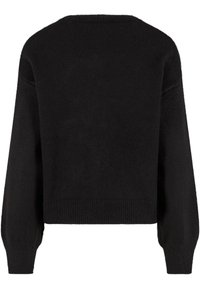 Črn skrajšan pulover iz mehke, teksturirane tkanine. Ima dolge rokave, okrogel izrez in rebraste manšete ter spodnji rob.