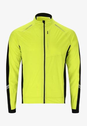 Helle gelbe Sportjacke mit schwarzen Akzenten, ausgestattet mit einem hohen Kragen, vollem Frontreißverschluss und reflektierenden Streifen auf den Schultern.
