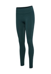 Leggings sans couture taille haute de couleur vert foncé avec une ceinture côtelée et de subtils motifs texturés sur les jambes.