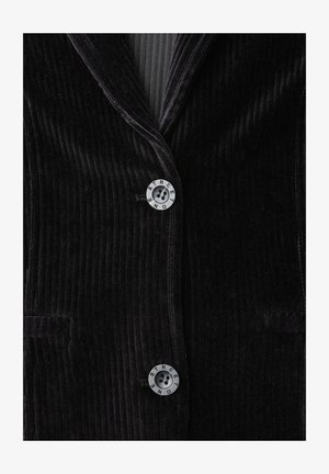 Schwarze Cordjacke mit vertikaler Rippstruktur, ausgestattet mit zwei Knöpfen im Runddesign und Fronttaschen.