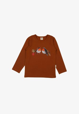 Long-sleeve rust-colored shirt featuring a graphic of two birds on a branch with foliage and red berries, made from soft cotton material.
