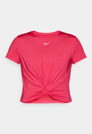 Roza kratka majica z dolgimi rokavi za športno aktivnost, ki ima na sprednji strani zapleteno vozlišče in majhen bel Nike logo na prsih.