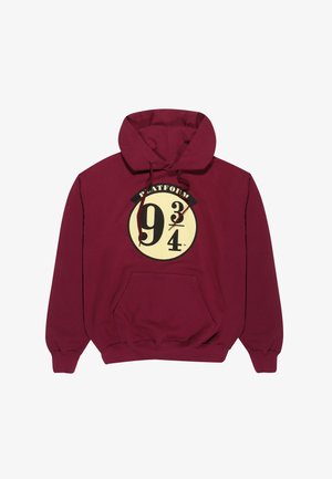 Felpa bordeaux con tasca frontale, caratterizzata da una grafica circolare che riporta la scritta "Platform 9¾" in crema e nero. Realizzata in tessuto morbido.
