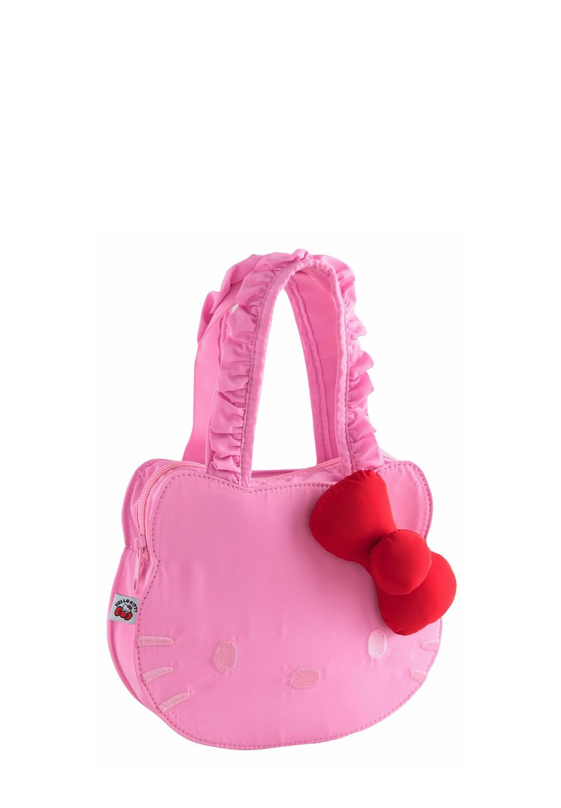 Sac à main rose en forme de Hello Kitty avec des poignées froncées et un grand nœud rouge à l'avant, doté d'une fermeture éclair sur le côté et d'une étiquette de logo.