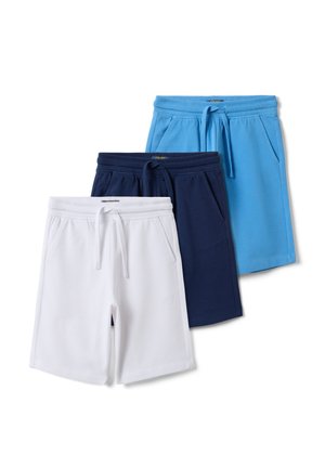 Drei Paar Baumwollshorts mit Kordelzug in Weiß, Dunkelblau und Hellblau, übereinander auf weißem Hintergrund angeordnet.